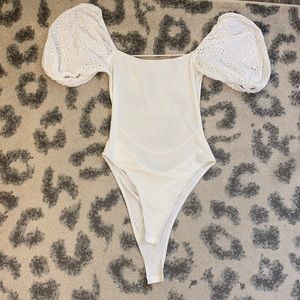 White open back balloon sleeve bodysuit